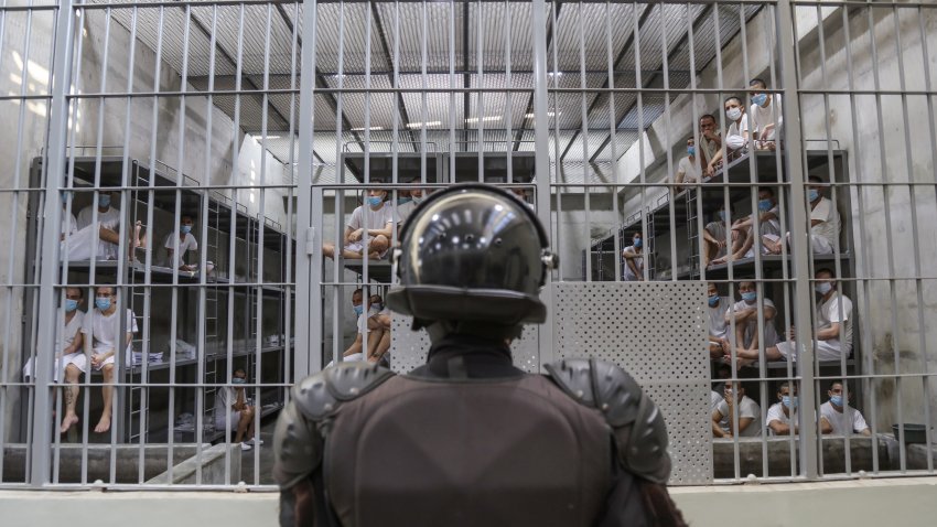 SAN VICENTE, EL SALVADOR – APRIL 4: A prison officer guards a cell at maximum security penitentiary CECOT (Center for the Compulsory Housing of Terrorism) on April 4, 2025 in Tecoluca, San Vicente, El Salvador. Amid internal legal dispute, Trump’s administration continues with its controversial and fast-paced deportation policy to El Salvador, as part of a partnership with President Bukele. The US Government acknowledged mistakenly deporting a Maryland resident from El Salvador with protected status and is arguing against returning him to the US. (Photo by Alex Peña/Getty Images)